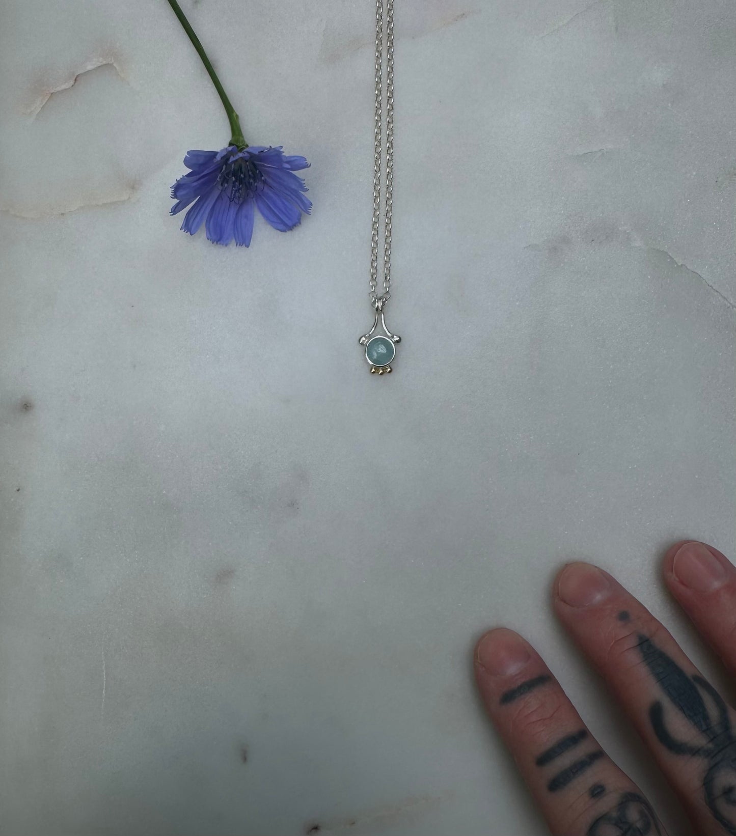 Silver necklace with 18k gold & aquamarine
