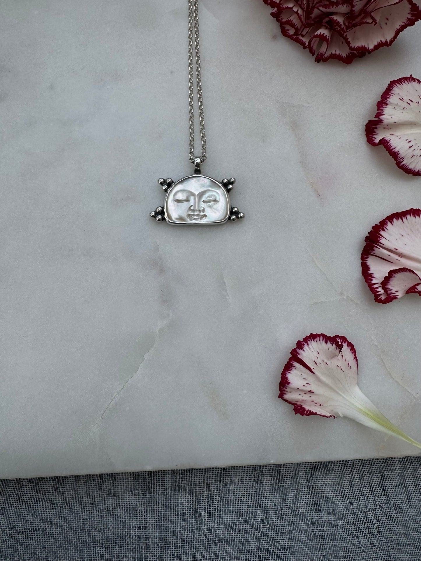 Mother of pearl moon face necklace