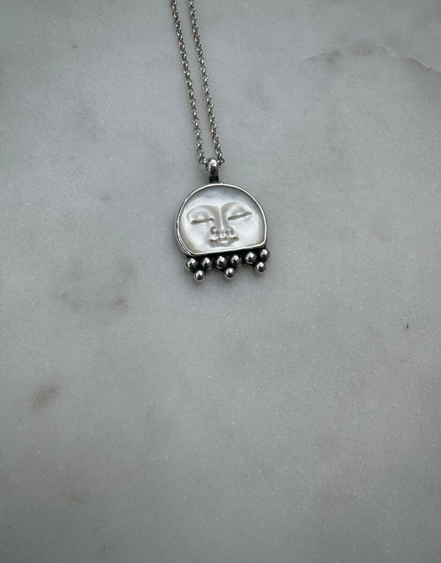Morher of pearl moon face necklace