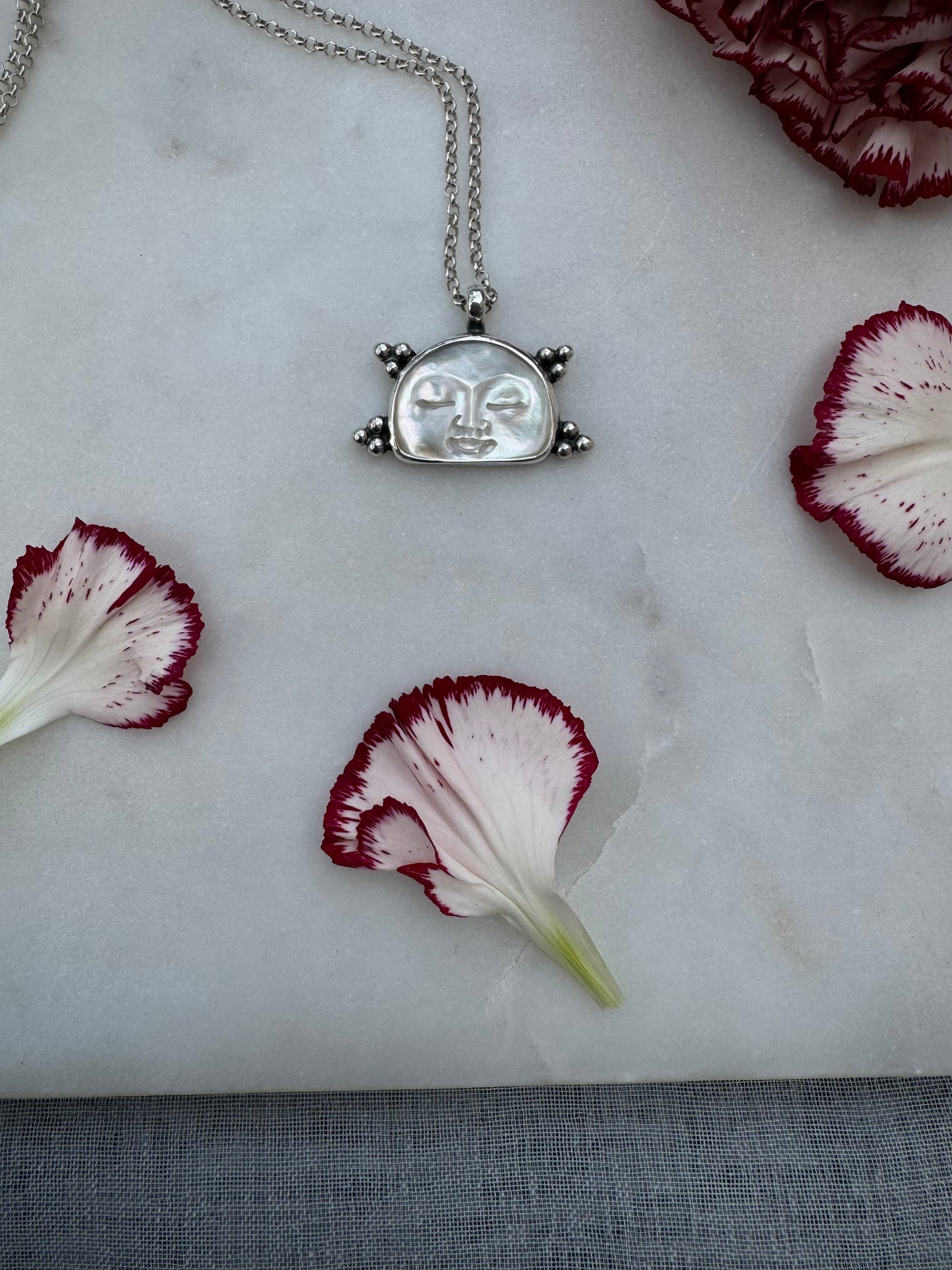 Mother of pearl moon face necklace