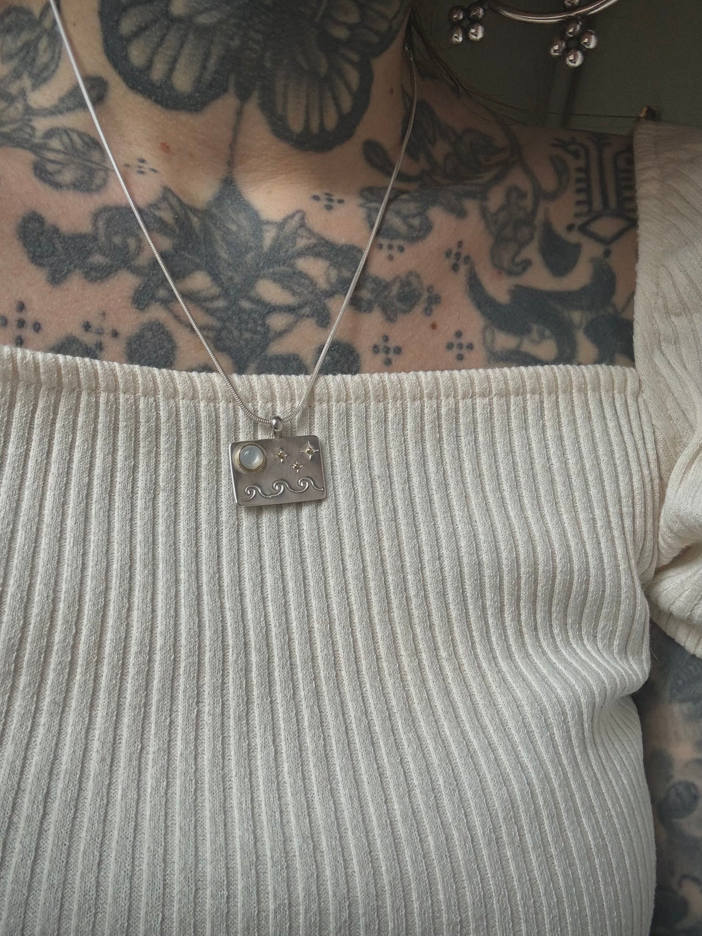 Moonstone amulet with 18k gold