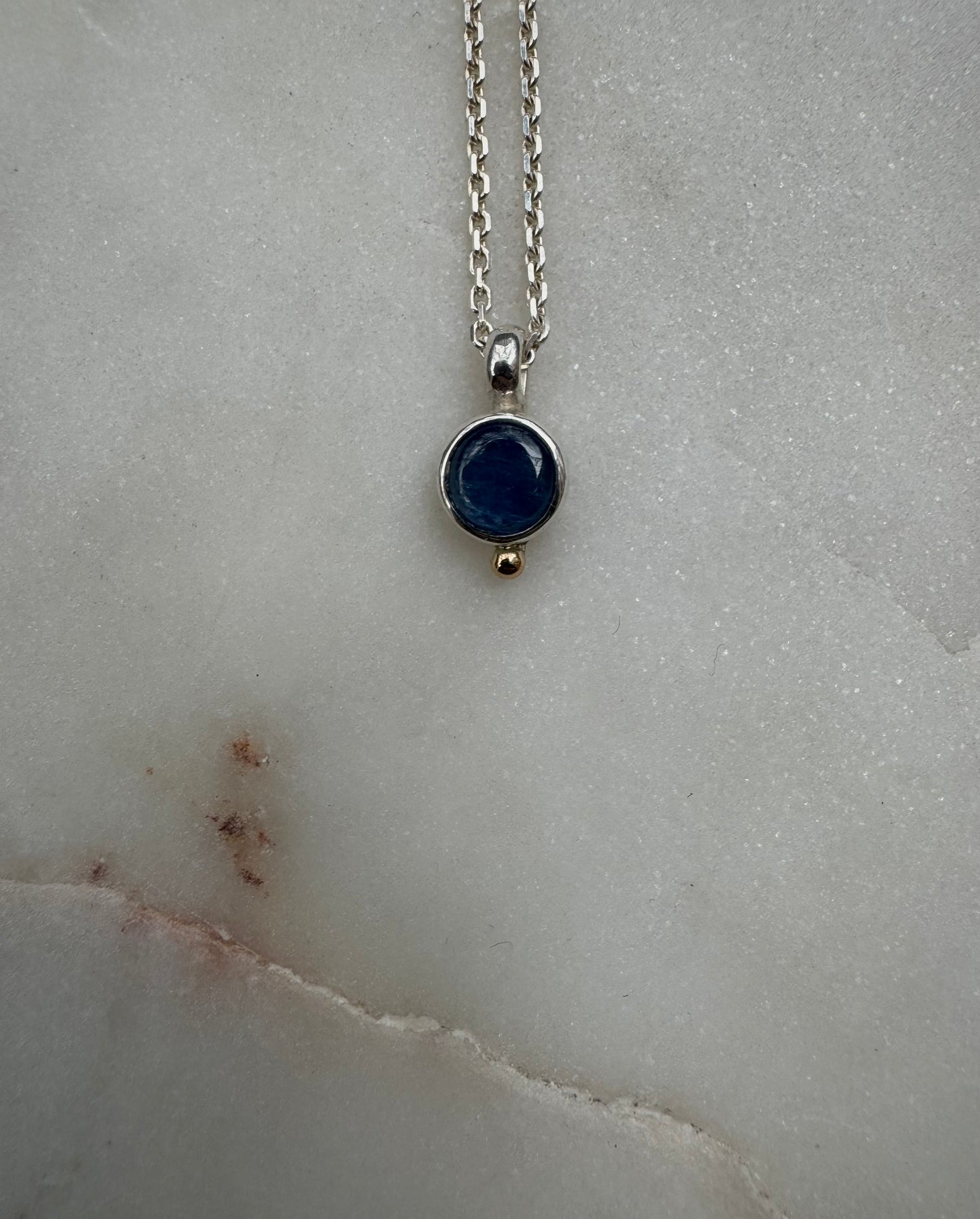 Small amulets with 18k gold