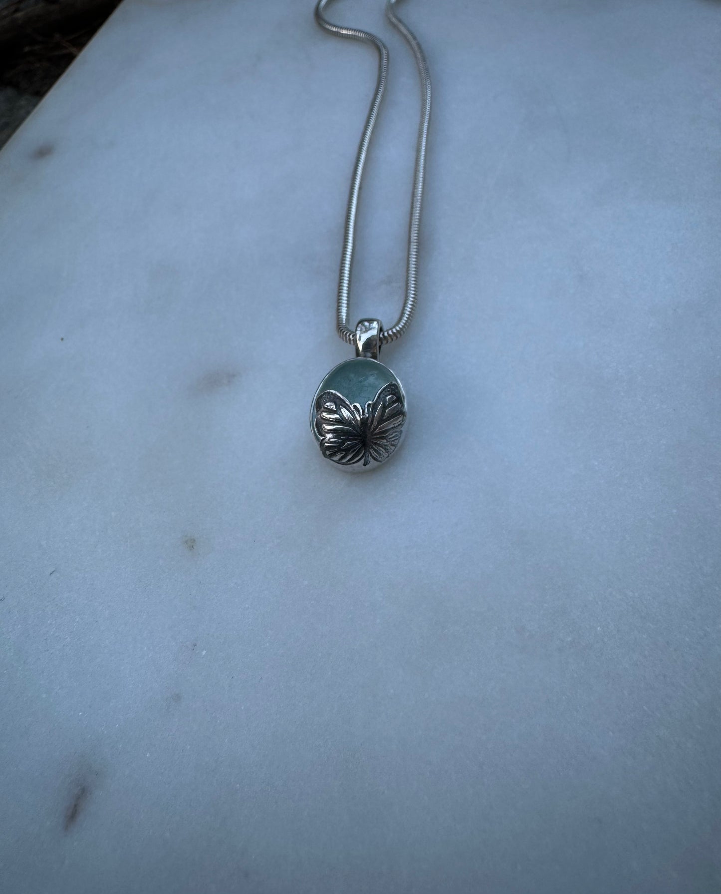 New life, Butterfly amulet with aquamarine