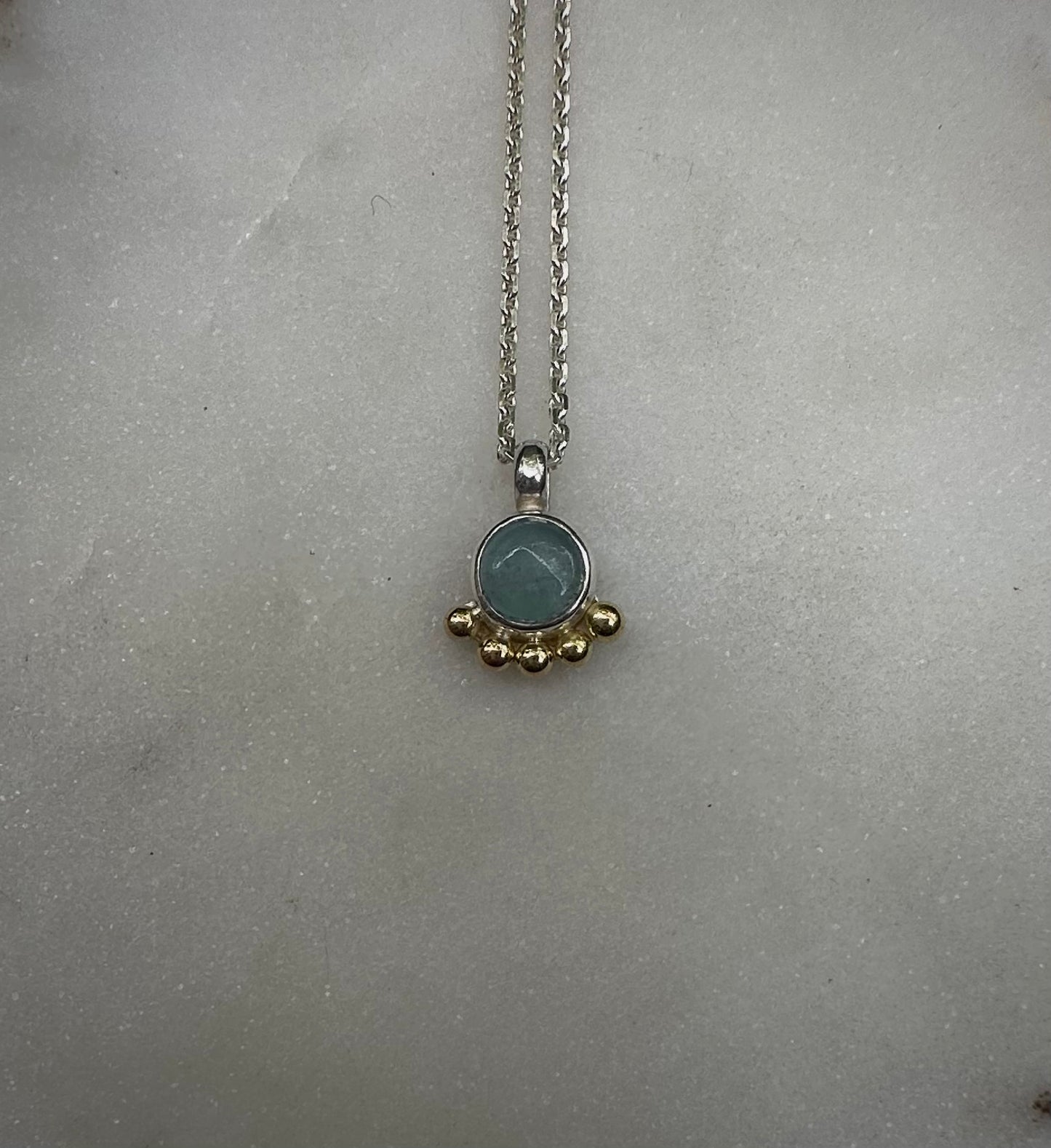 Beautiful aquamarin amulet with 18k gold