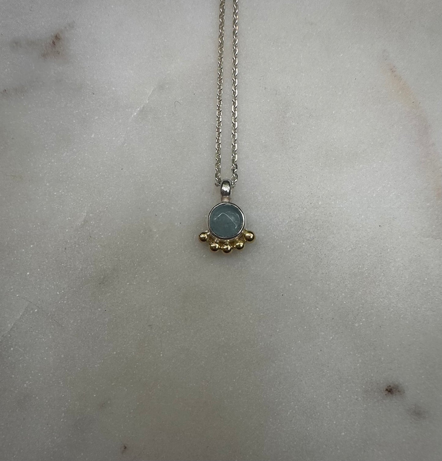 Beautiful aquamarin amulet with 18k gold