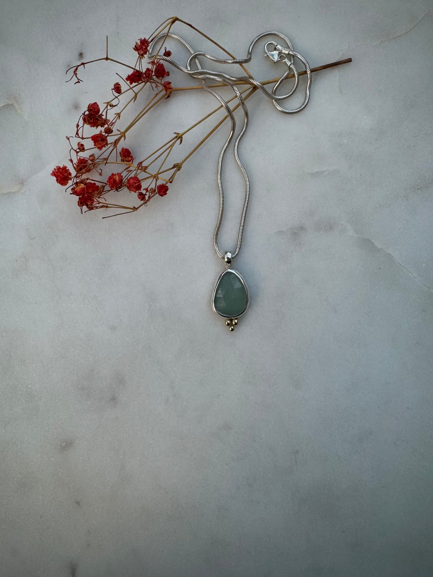 Rose cut aquamarine with 14k gold
