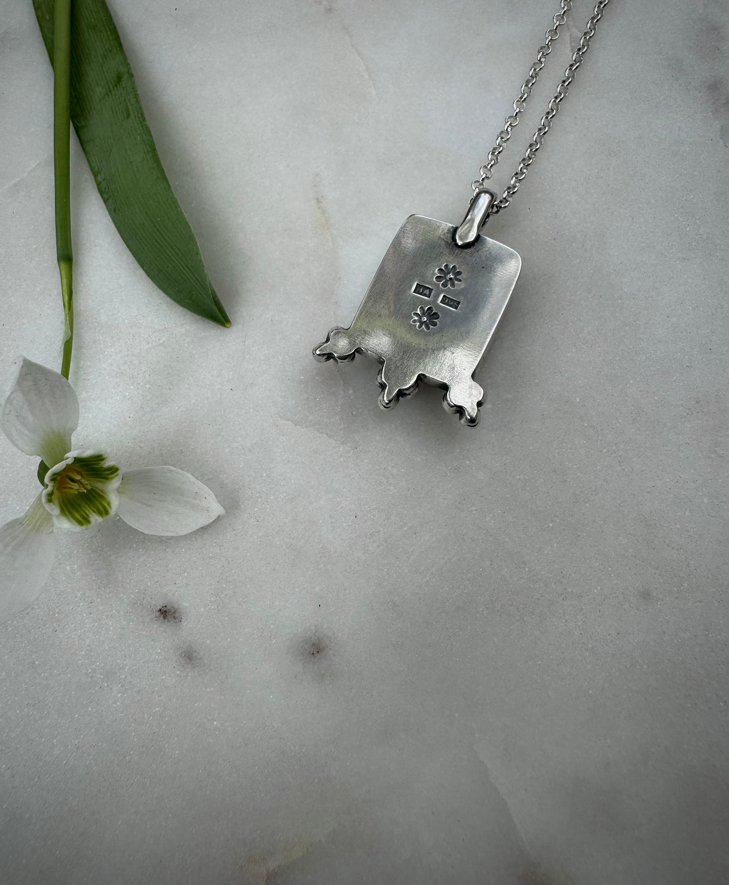 Silver necklace with fossiled coral