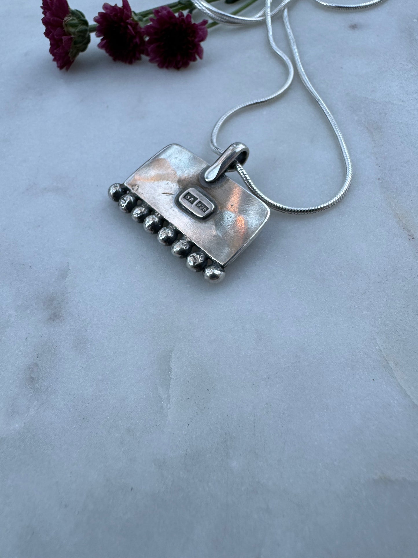 Soulkeeper amulet with garnet