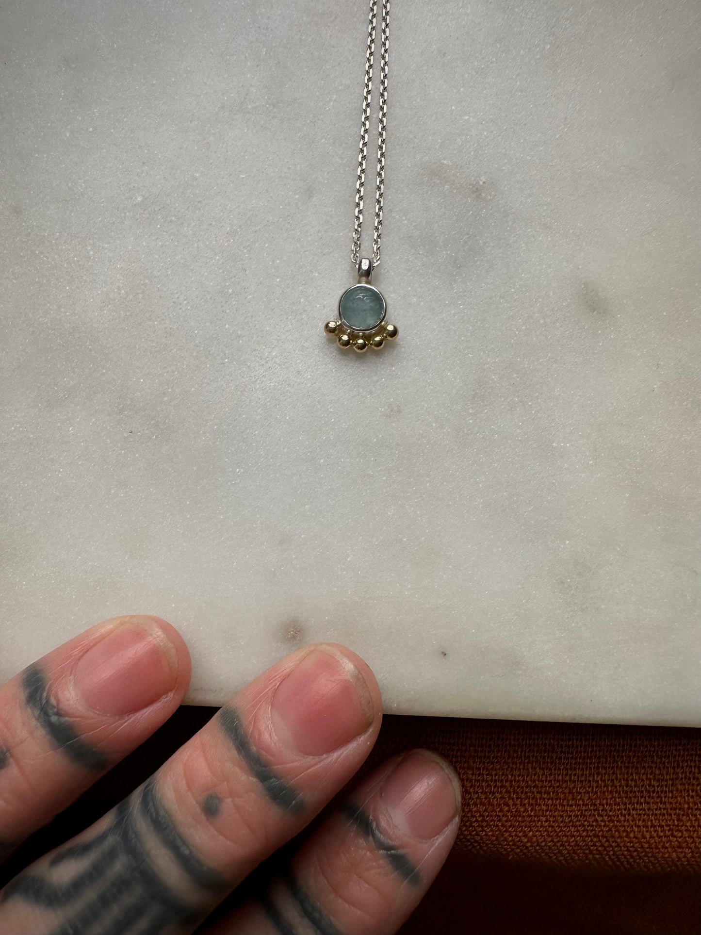Beautiful aquamarin amulet with 18k gold