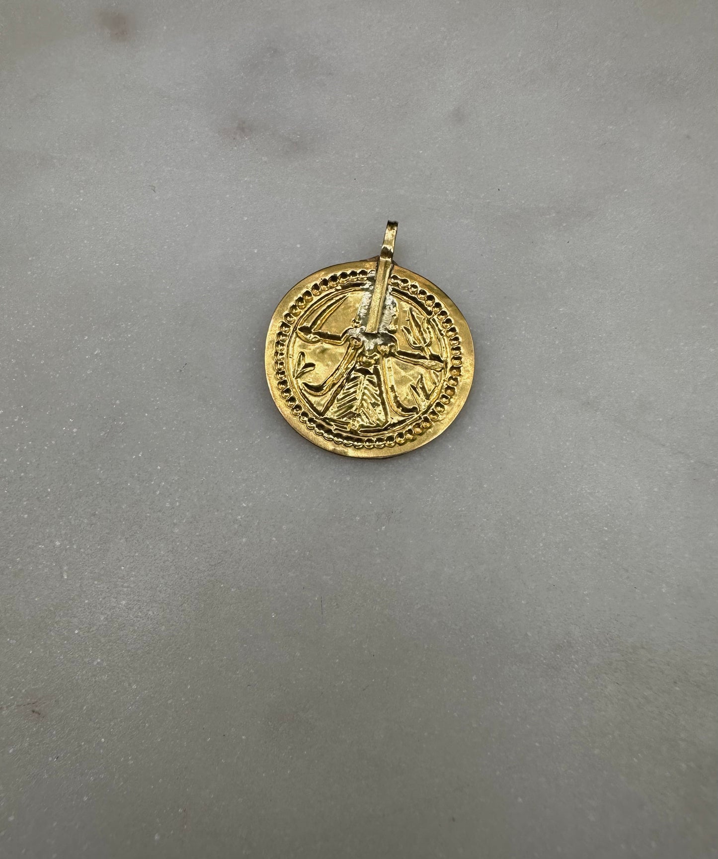23 k gold old goddess Kali amulet