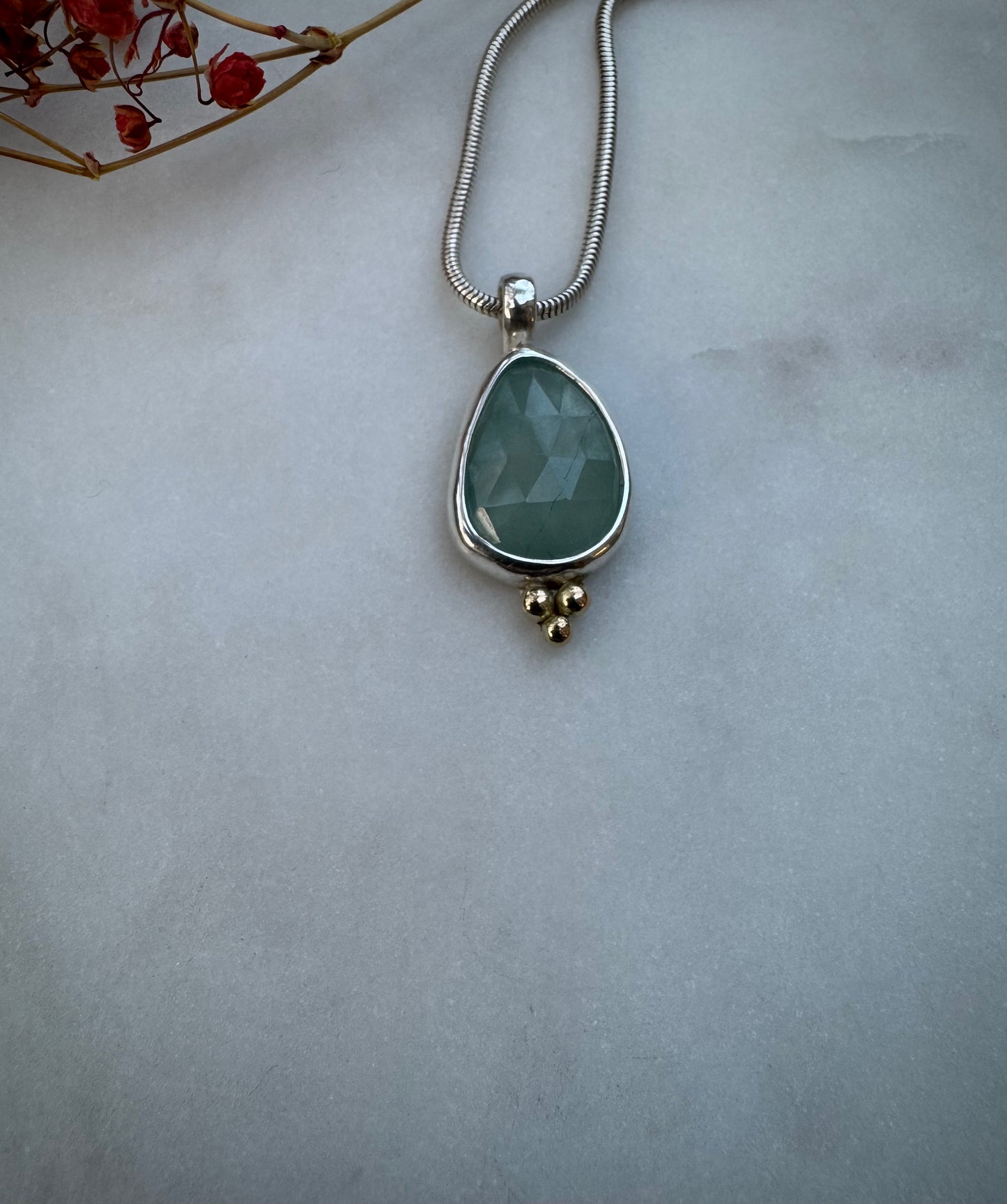 Rose cut aquamarine with 14k gold
