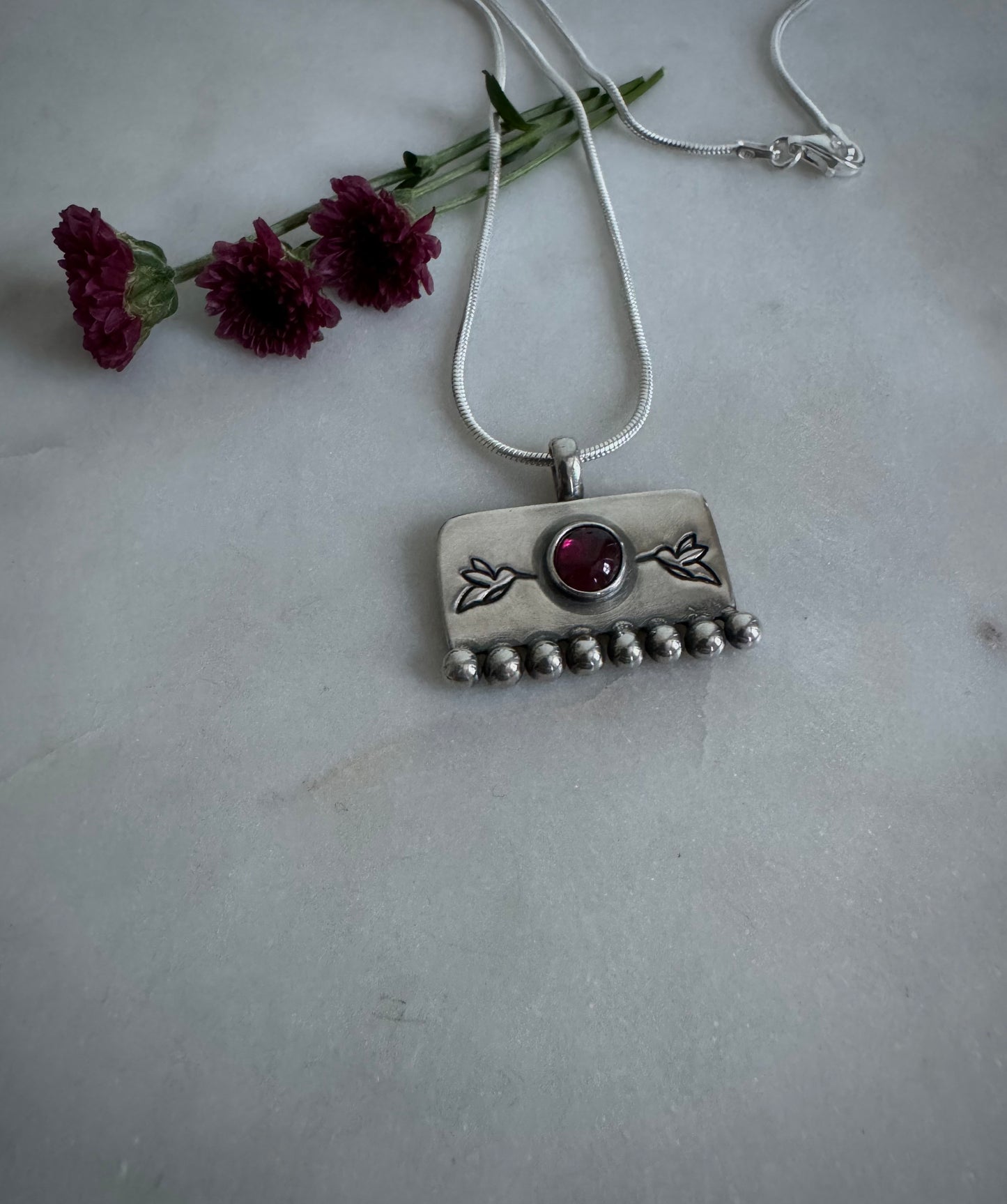 Soulkeeper amulet with garnet