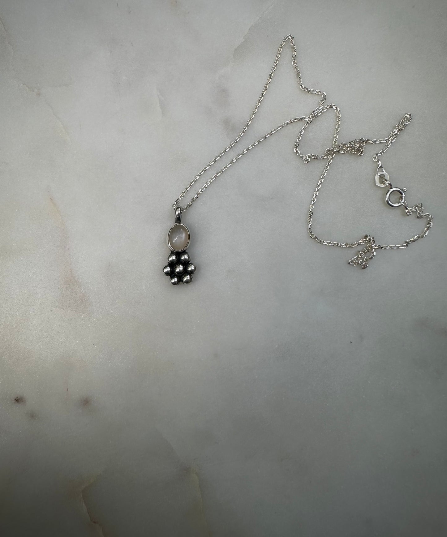 Moonstone flower amulet