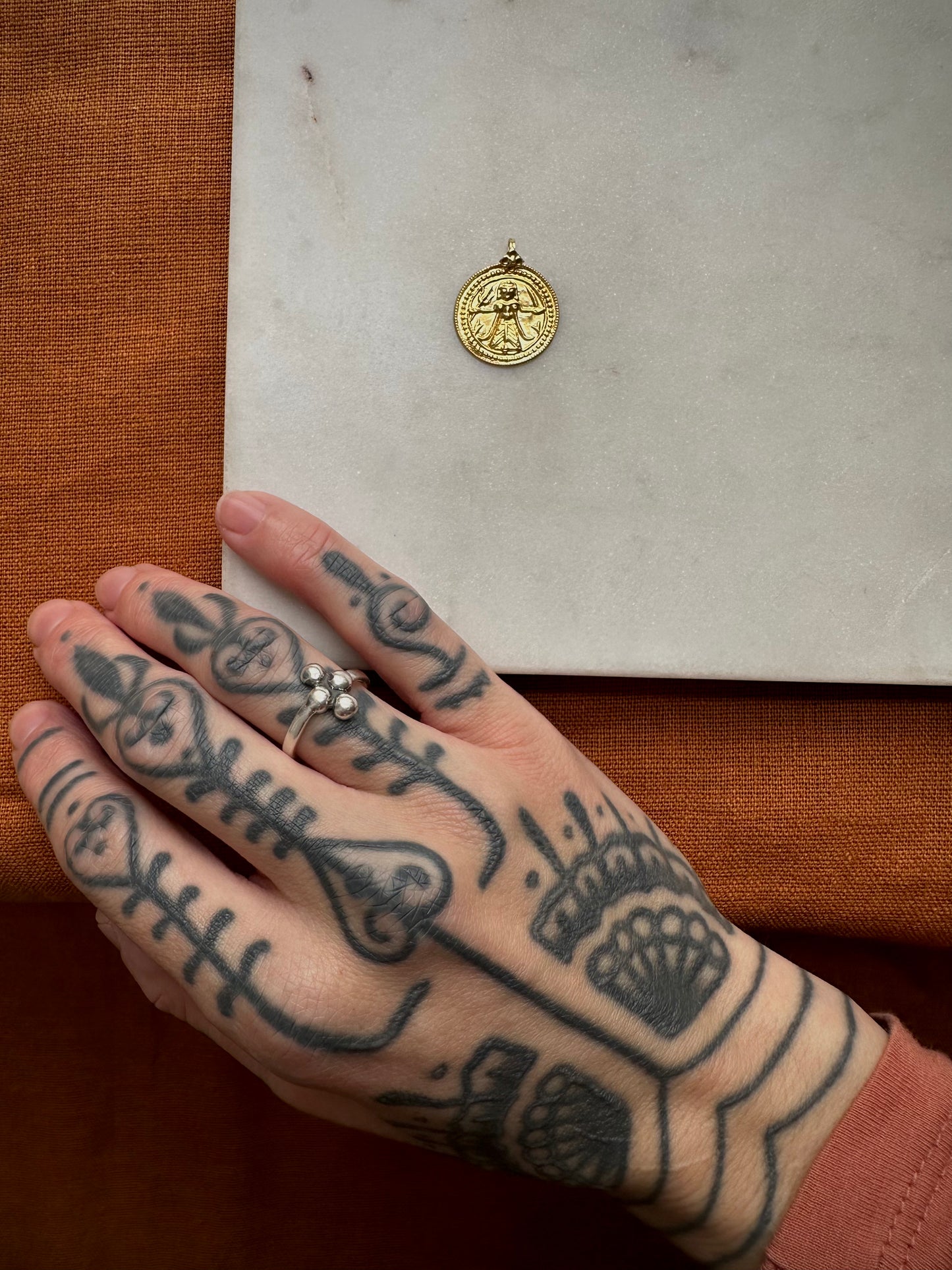 23 k gold old goddess Kali amulet