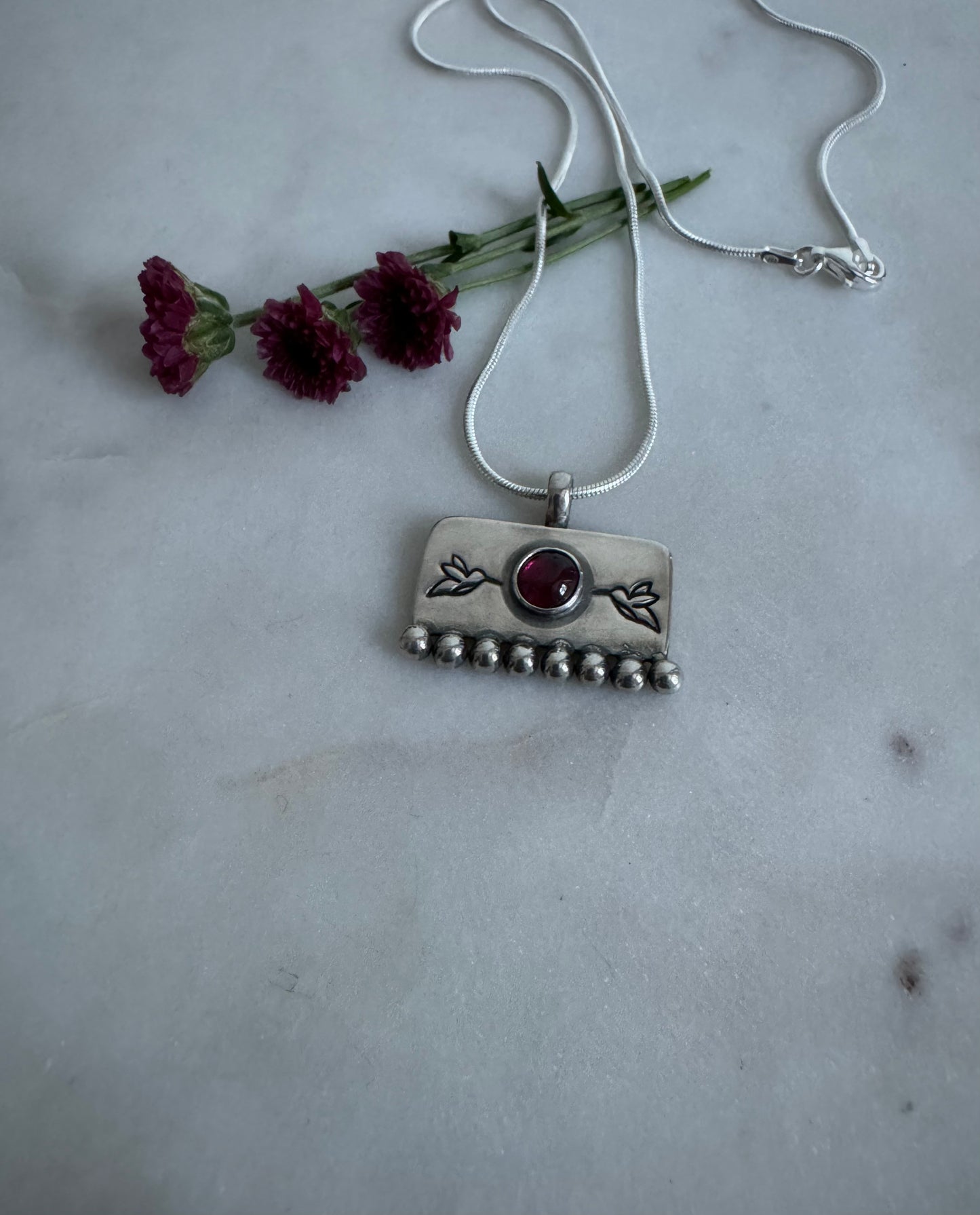Soulkeeper amulet with garnet