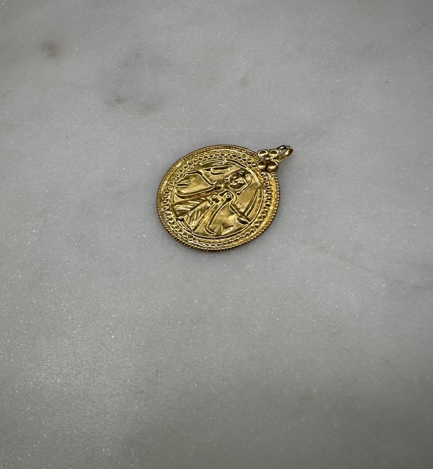 23 k gold old goddess Kali amulet