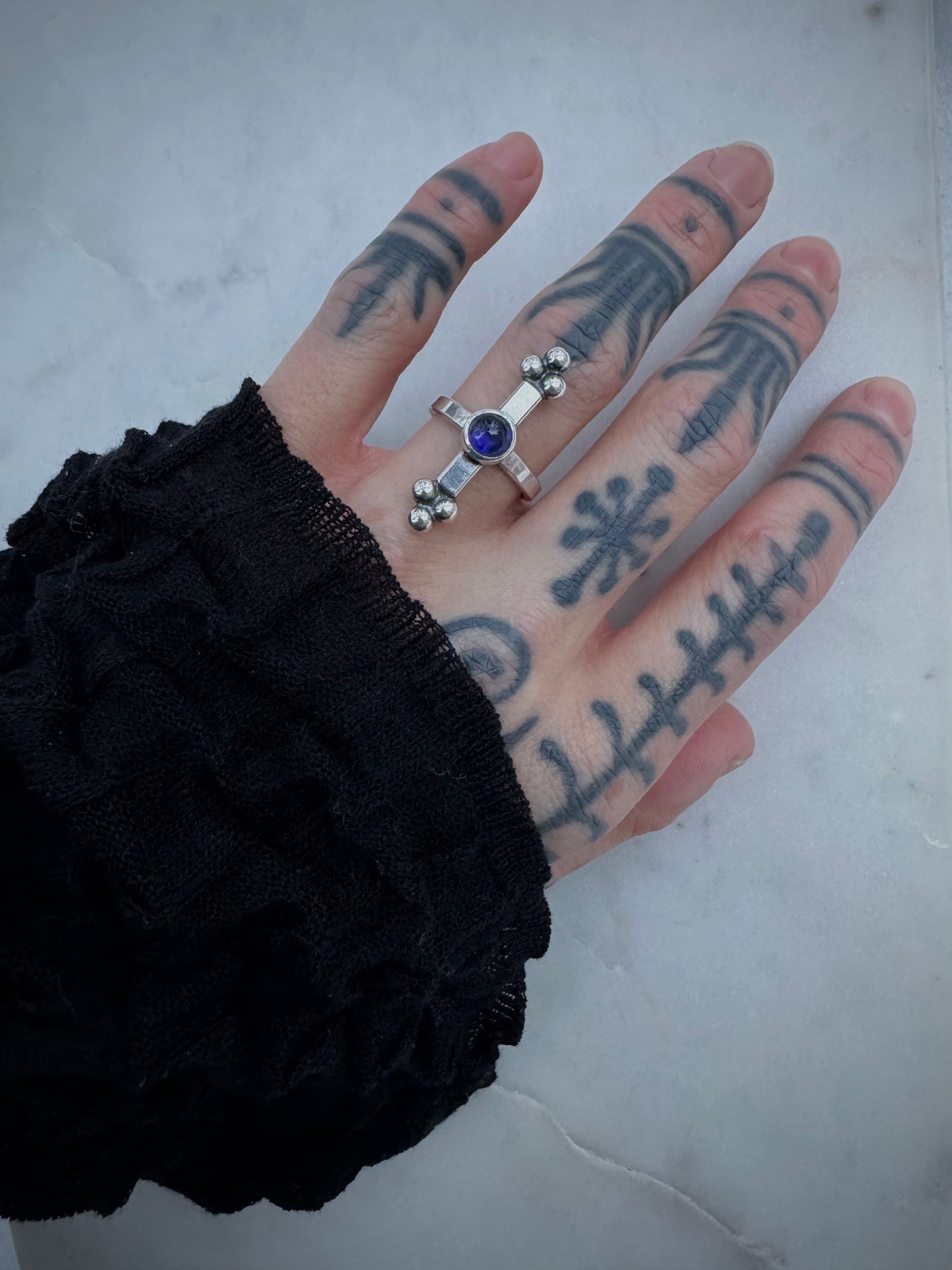 Silver ring with lolite