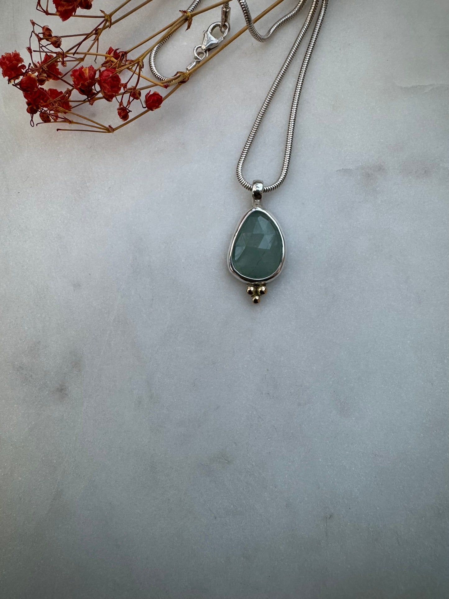 Rose cut aquamarine with 14k gold