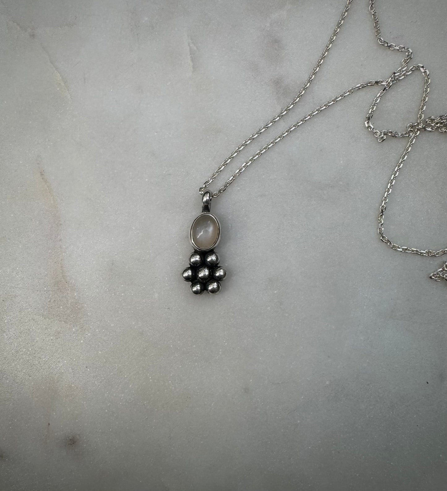Moonstone flower amulet