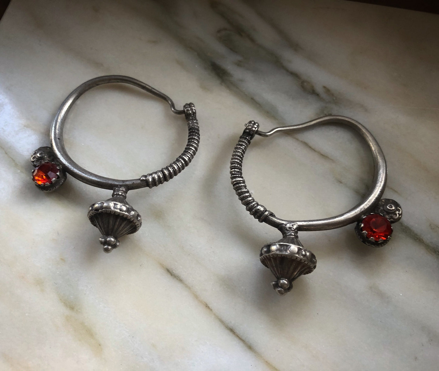 Antique poppy seed ear weights from northen Pakistan