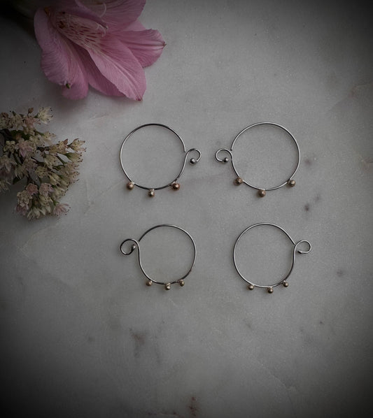 Beautiful simple silver earrings with 14k gold dots