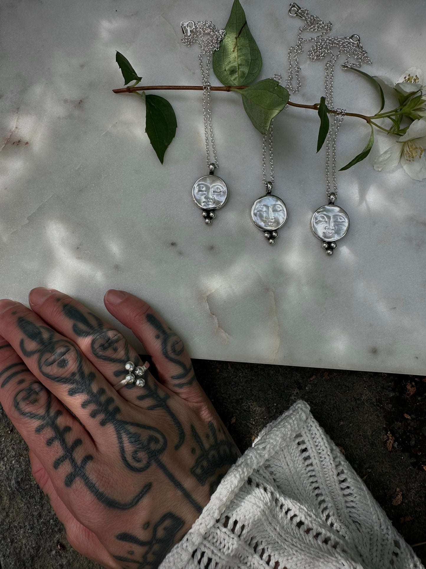 Mother of pearl moon face silver necklace