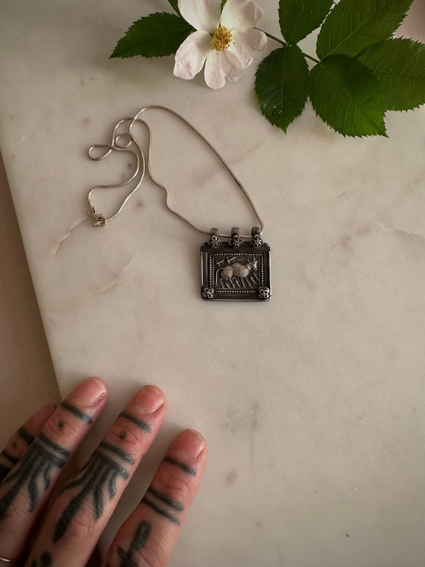 Antique old vintage Holy cow silver amulet from Rajasthan, India