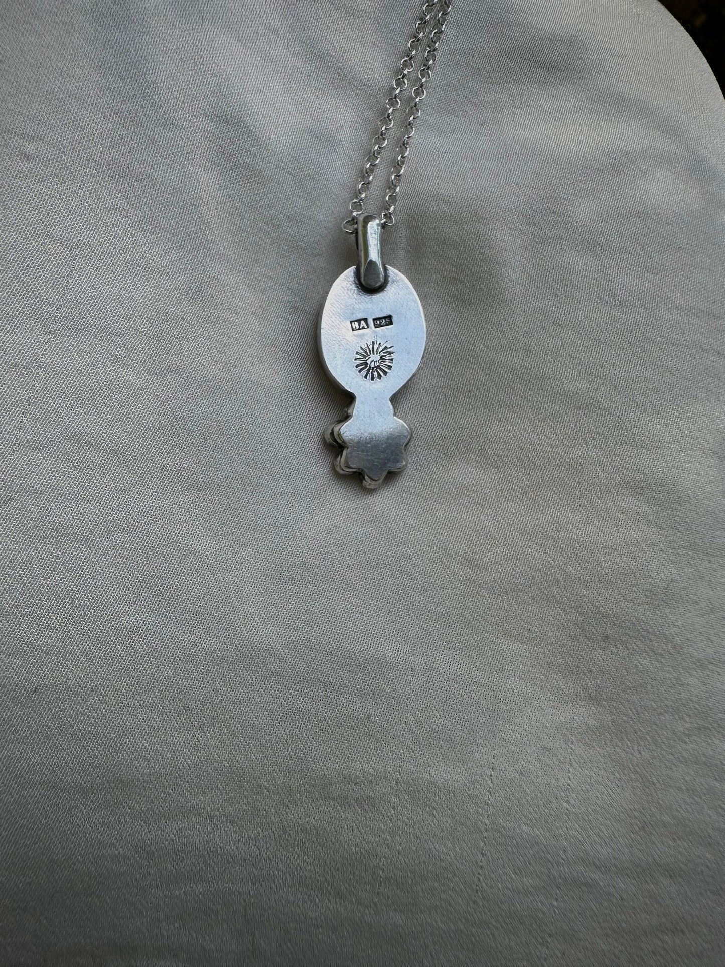 Moonstone flower silver amulet