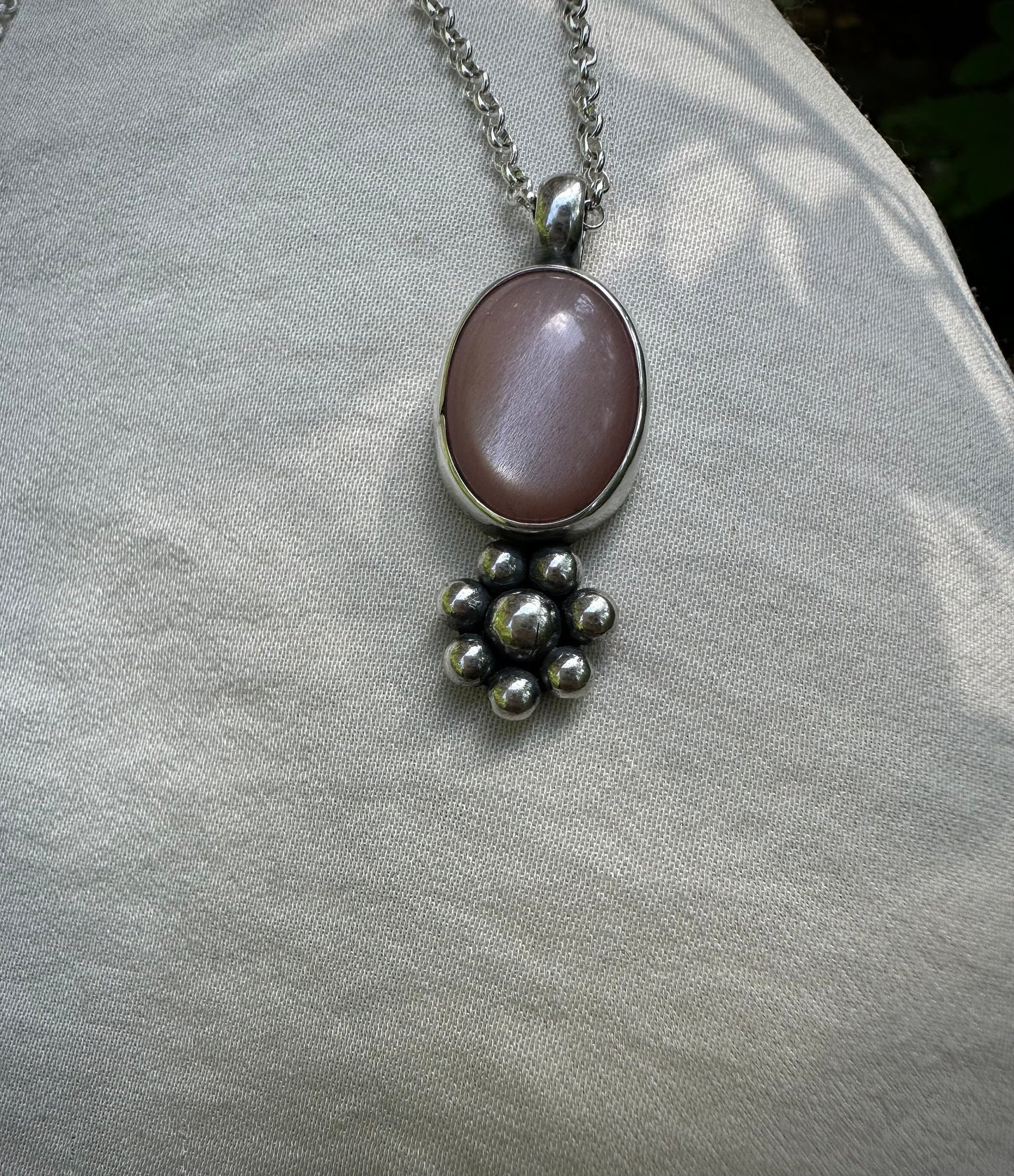 Moonstone flower silver amulet