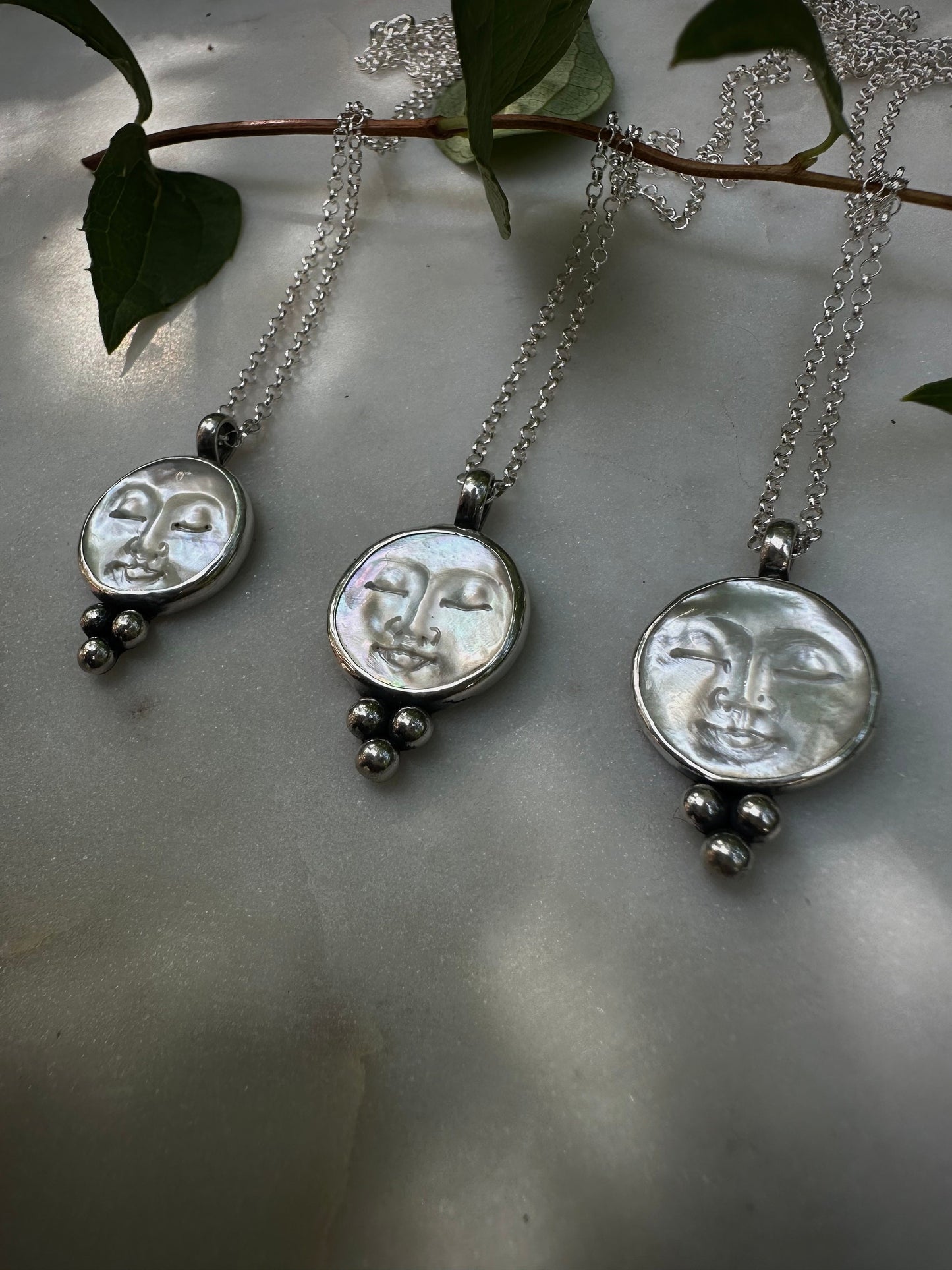 Mother of pearl moon face silver necklace