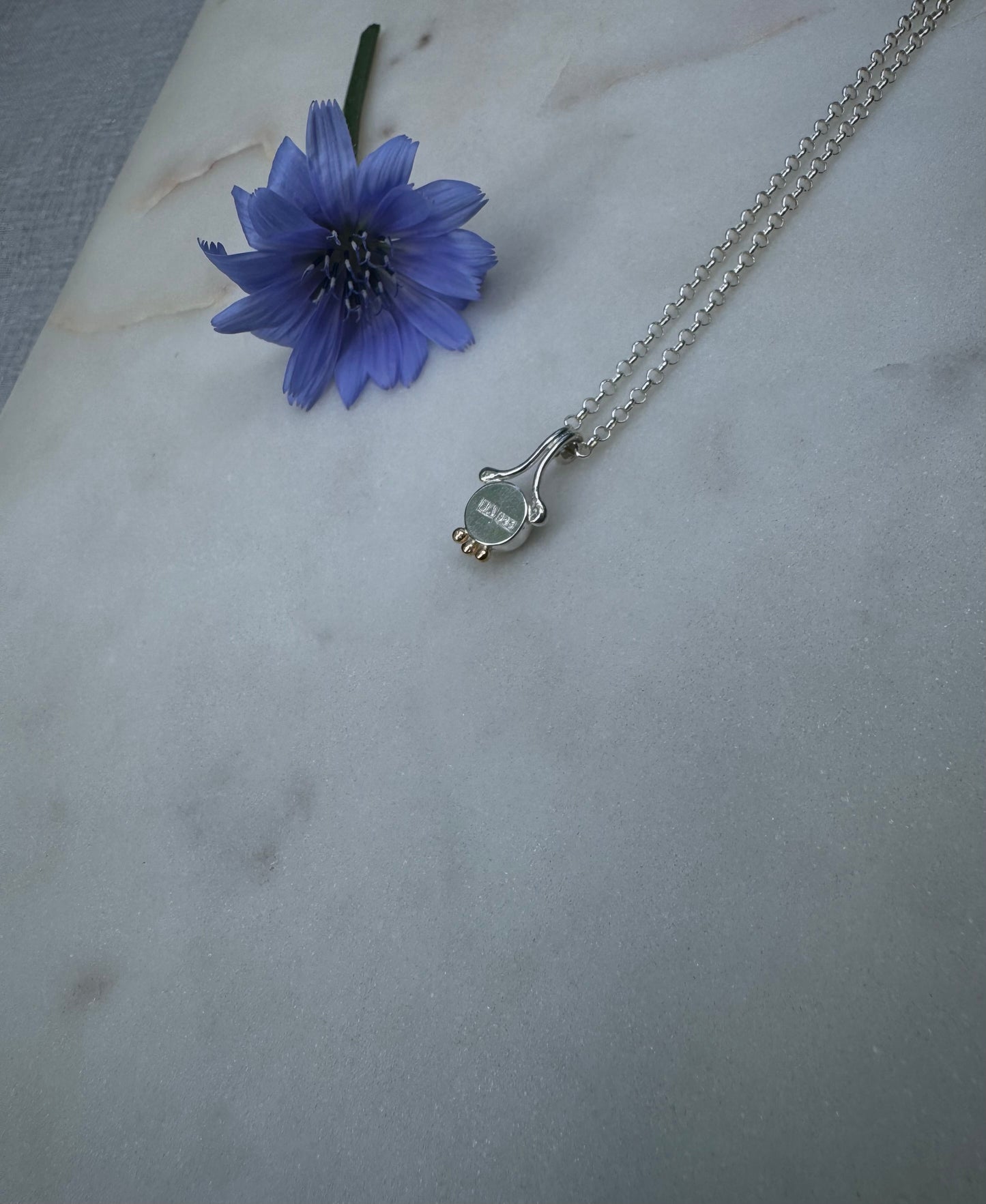 Silver necklace with 18k gold & aquamarine