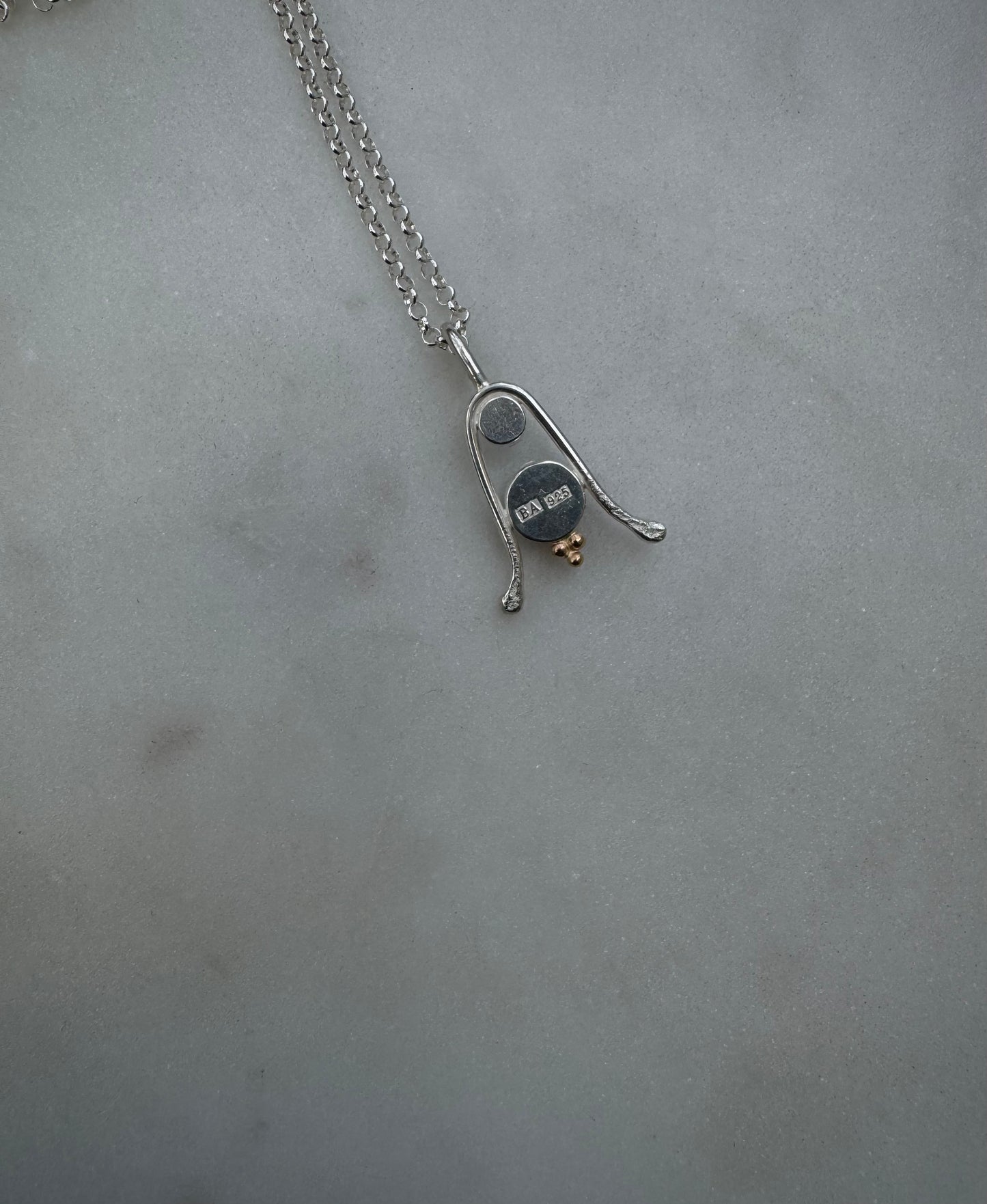 Amulet with Tanzanite, Garnet and 18k gold