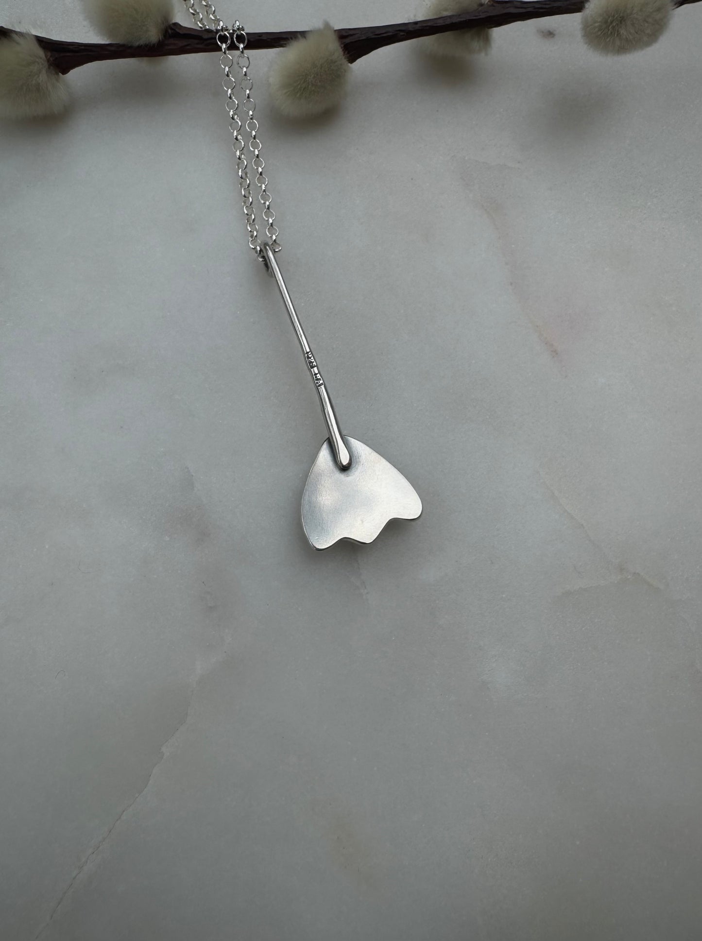 Aquamarine flower amulet