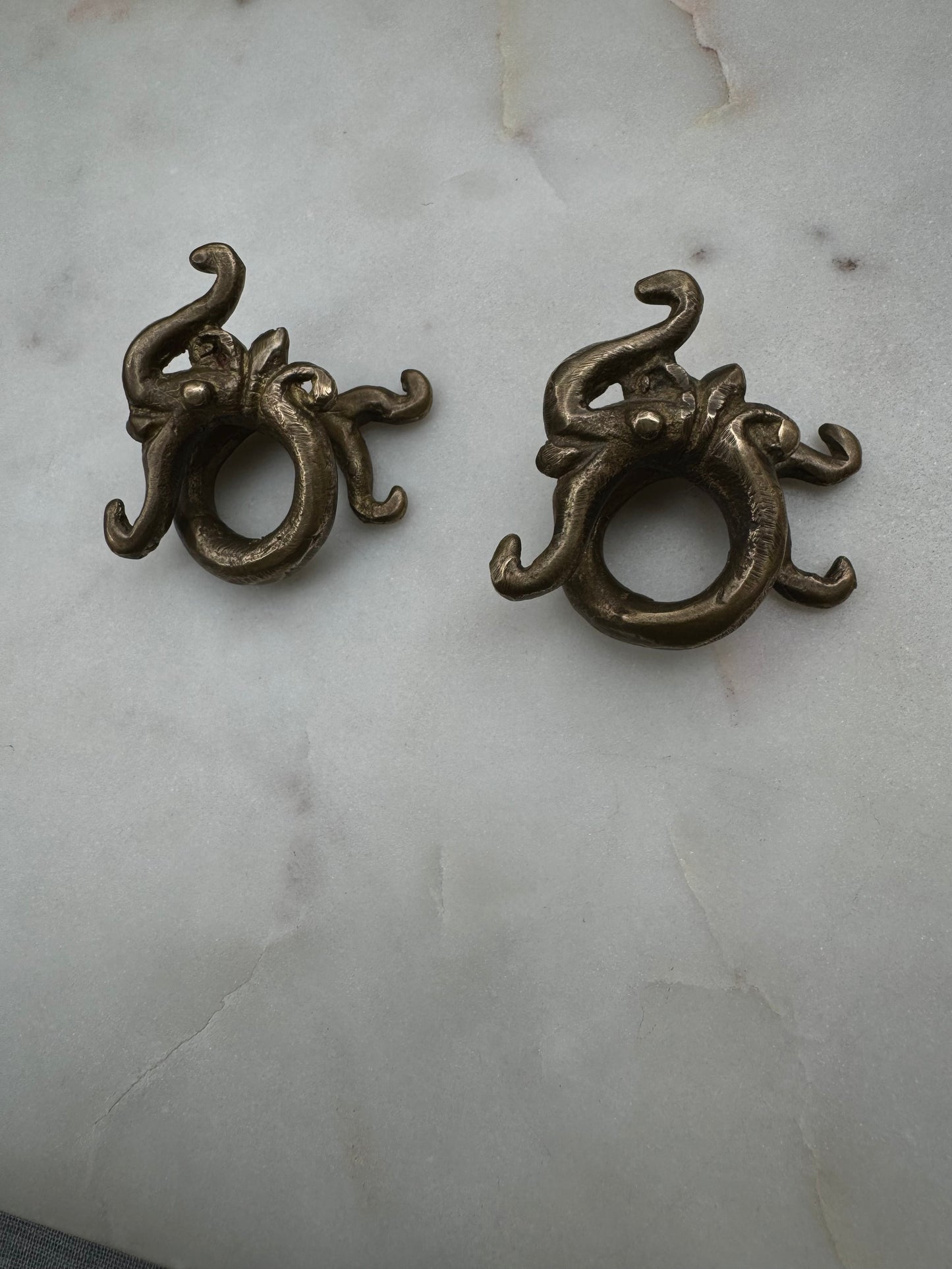 Dragon brass war weights from Borneo