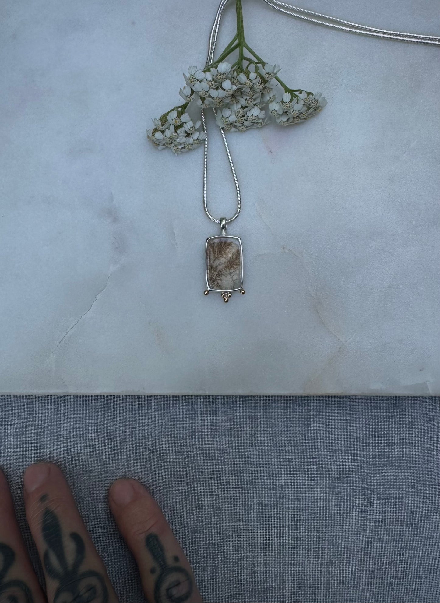 Dendritic quartz amulet with 18k gold