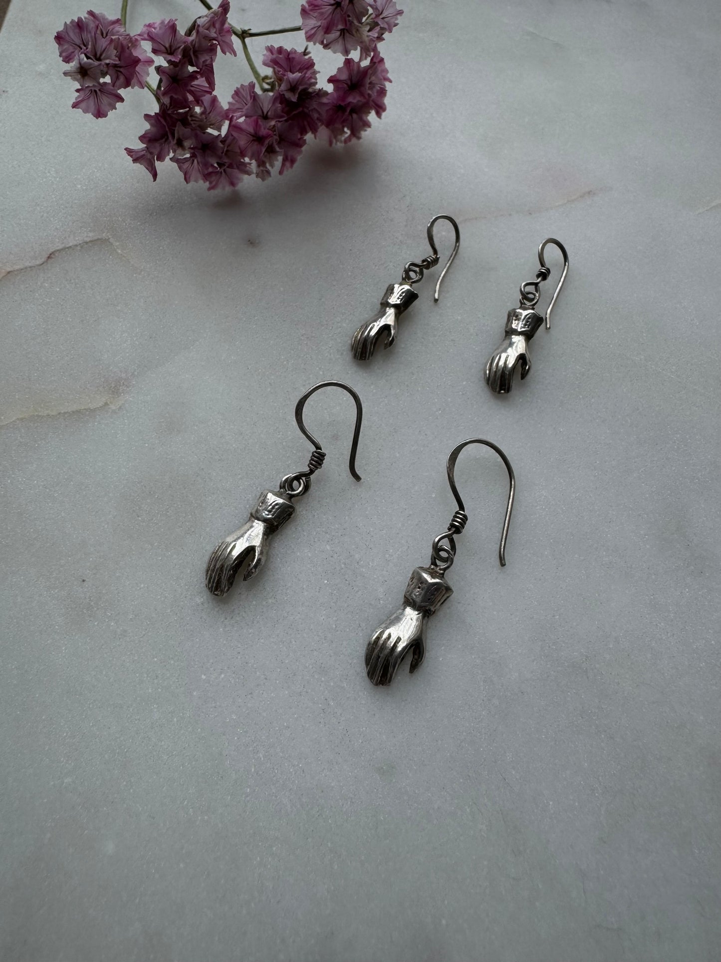 Silver hand earrings