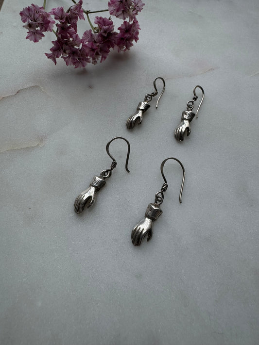 Silver hand earrings