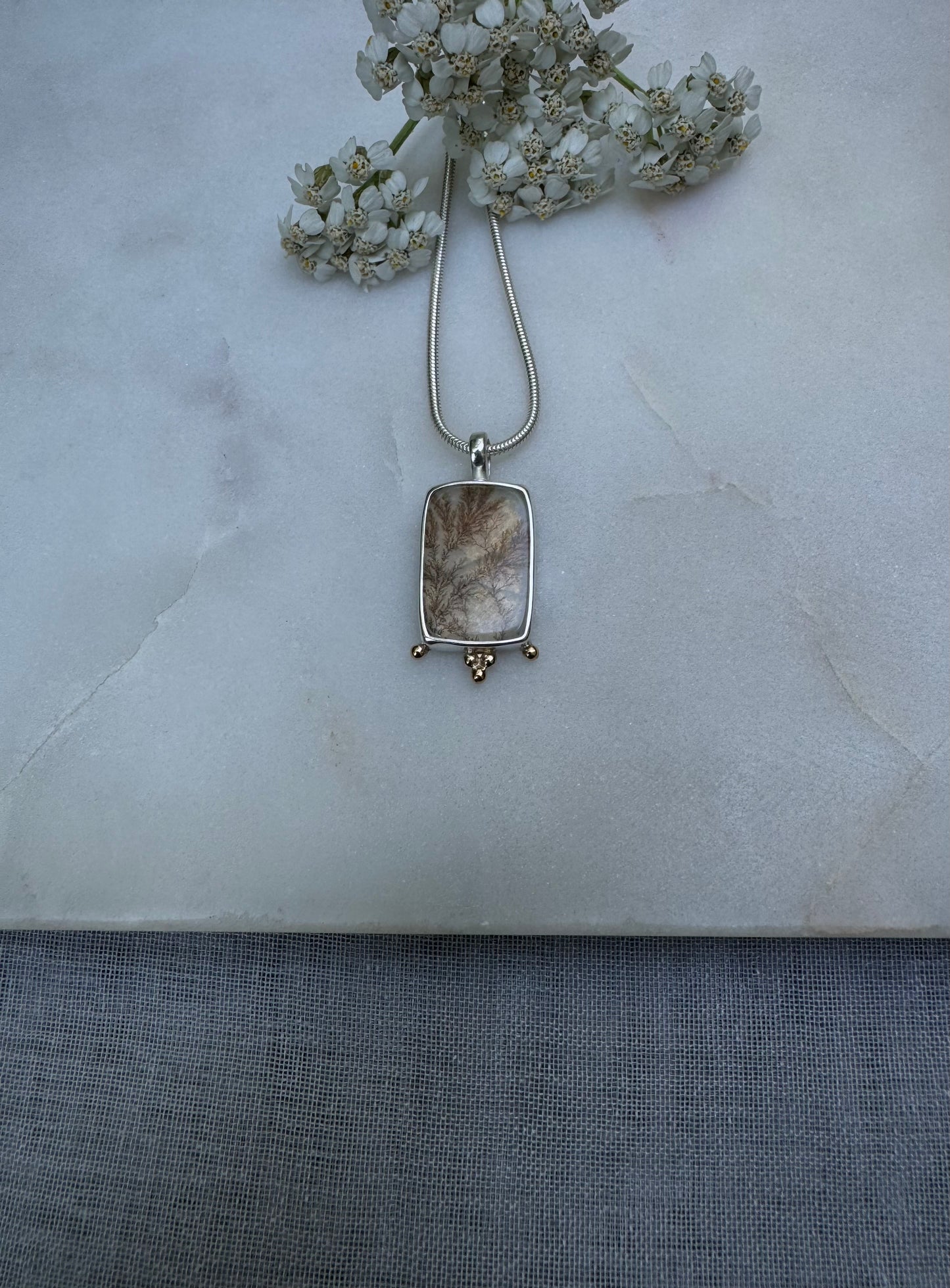 Dendritic quartz amulet with 18k gold