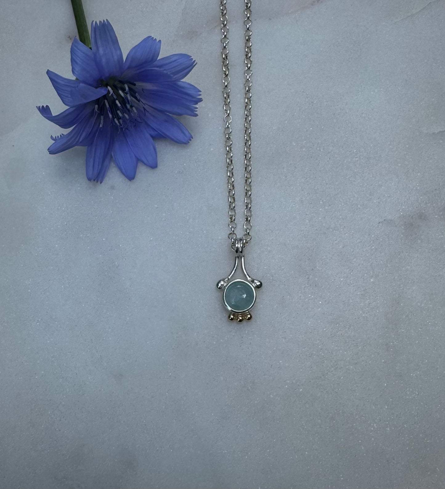 Silver necklace with 18k gold & aquamarine