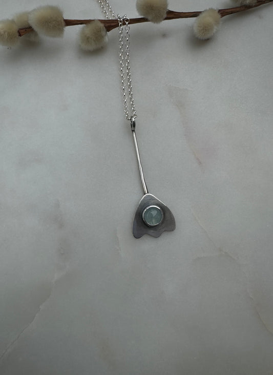 Aquamarine flower amulet