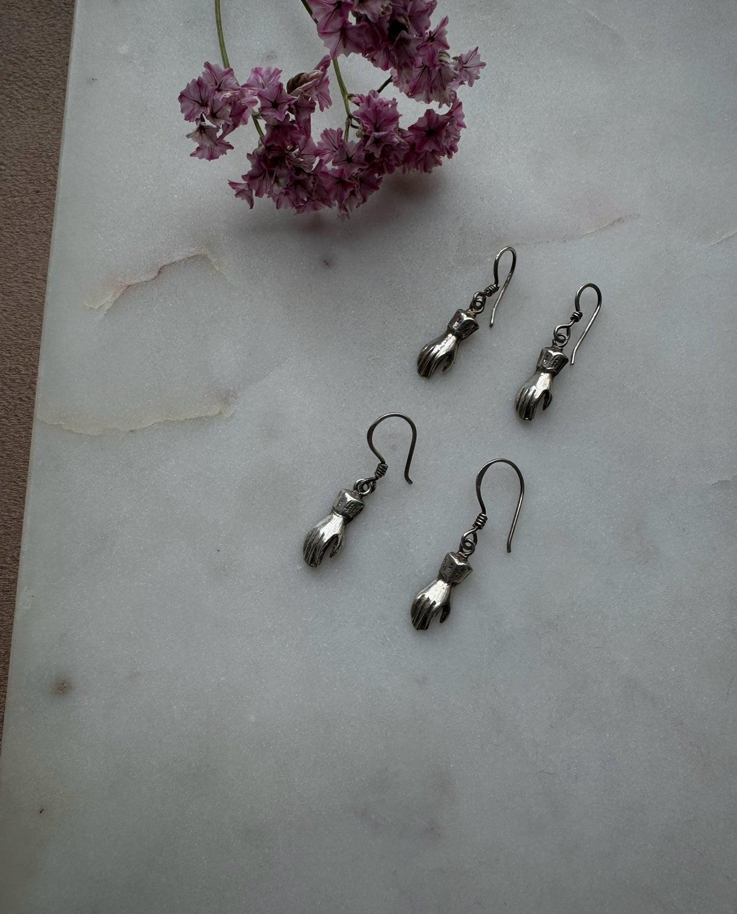 Silver hand earrings