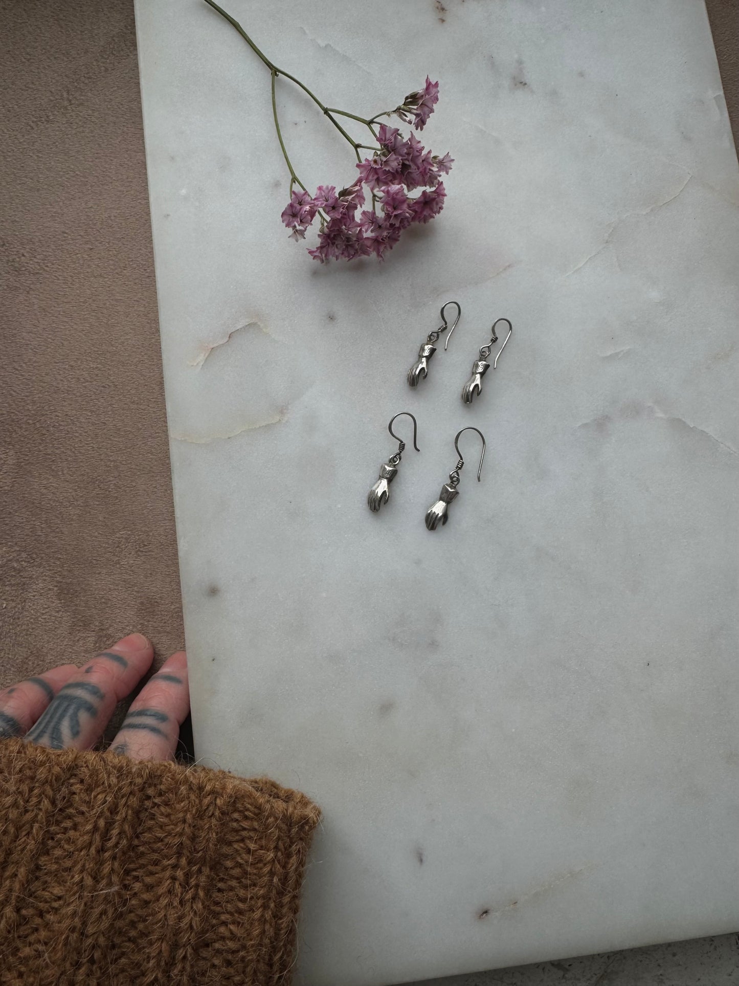 Silver hand earrings