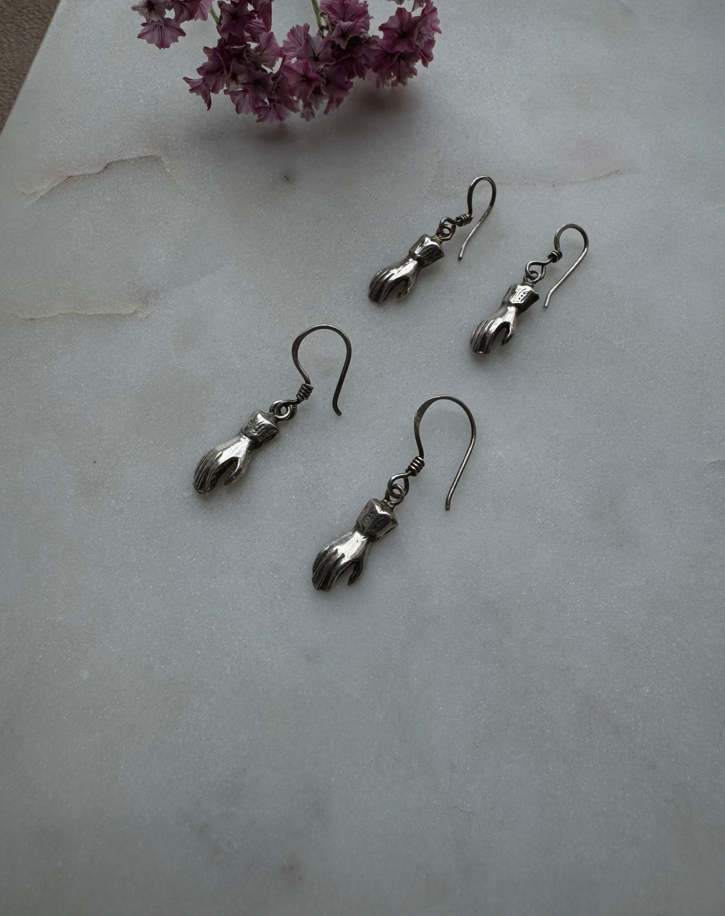 Silver hand earrings