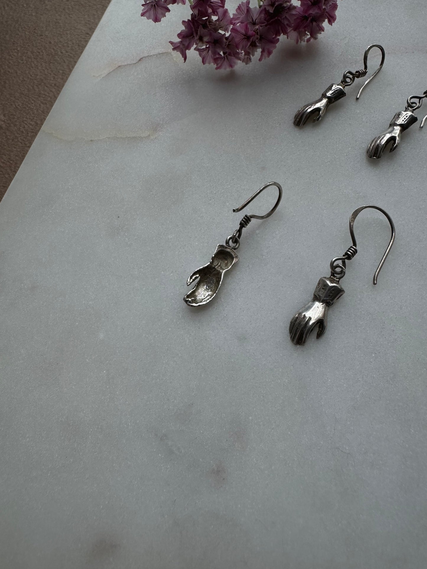 Silver hand earrings