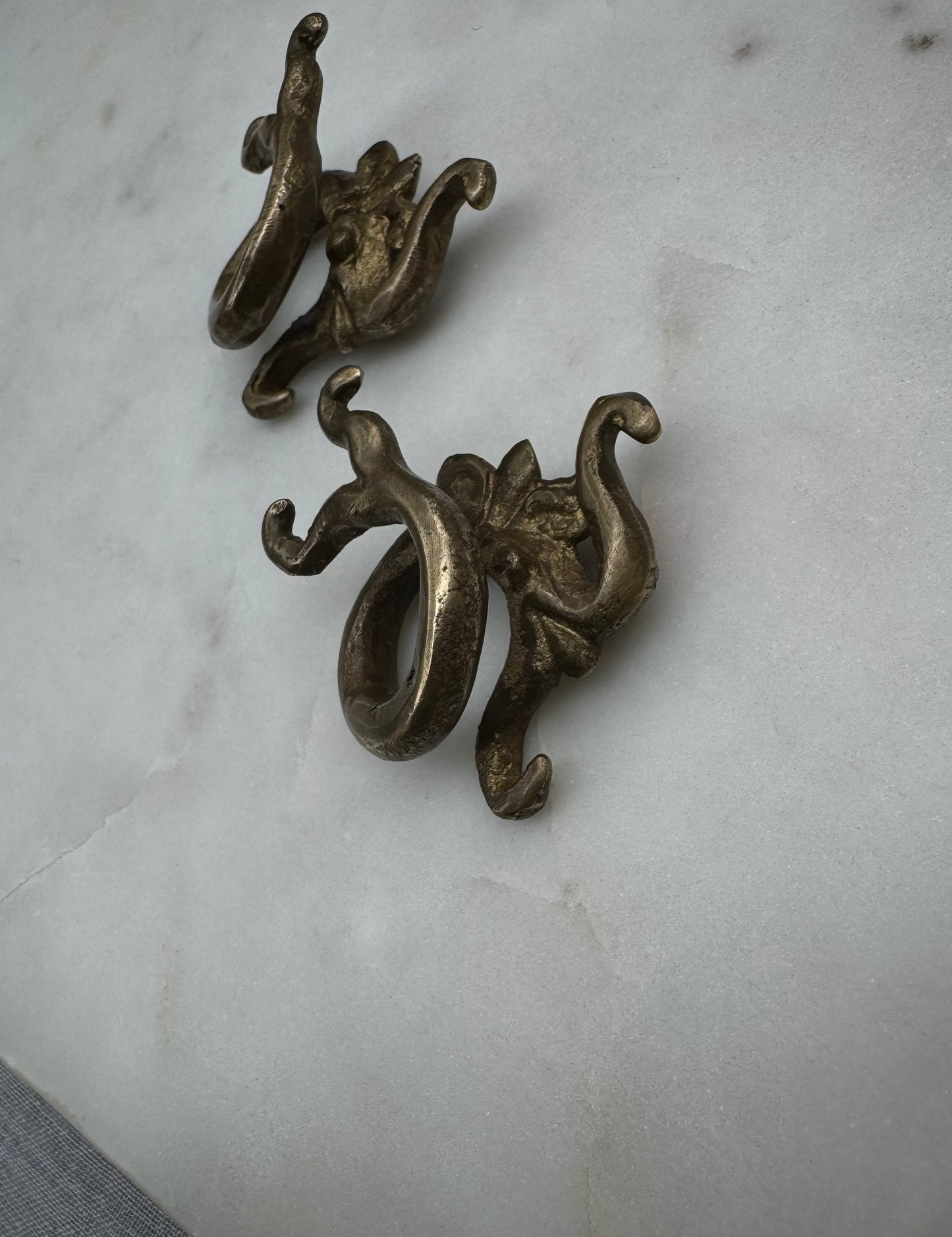 Dragon brass war weights from Borneo