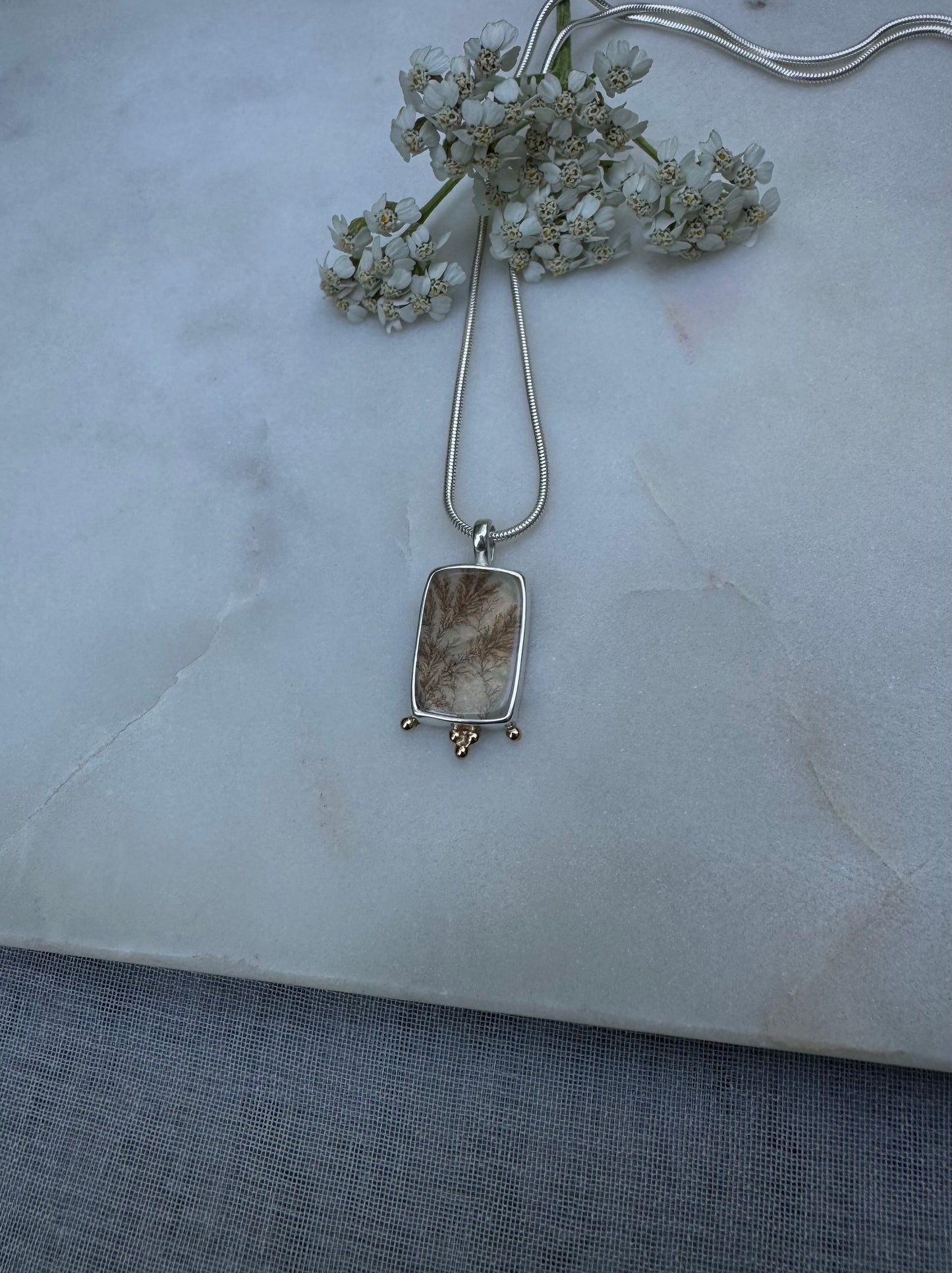 Dendritic quartz amulet with 18k gold