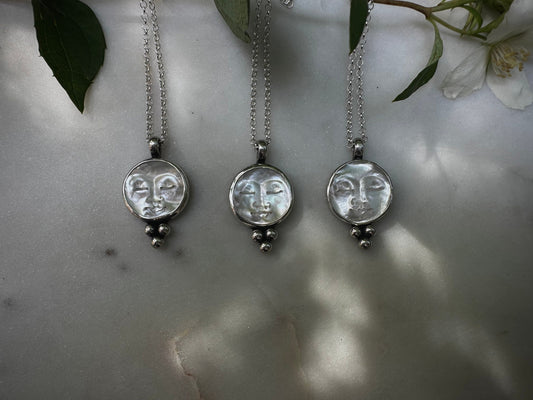 Mother of pearl moon face silver necklace